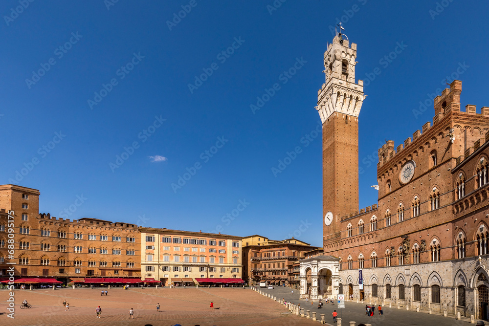Siena, Italy - July 26, 2023: Piazza del Campo with Palazzo Pubblico and Torre del Mangia in Siena, Italy