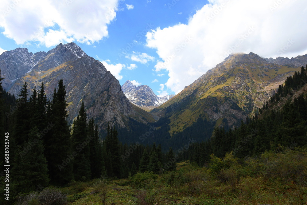 Eighth stage of Ak-Suu Traverse trek from Ala-kol lake to Karakol Gorge in Karakol national park, Kyrgyzstan