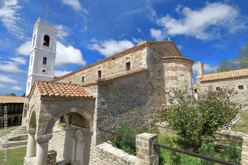 The Saint Mary Church with its 24 m high white belfry in the Nativity of the Theotokos Monastery. Ardenica-Albania-099
