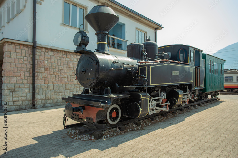 Naklejka premium old locomotive at railway station Podgorica
