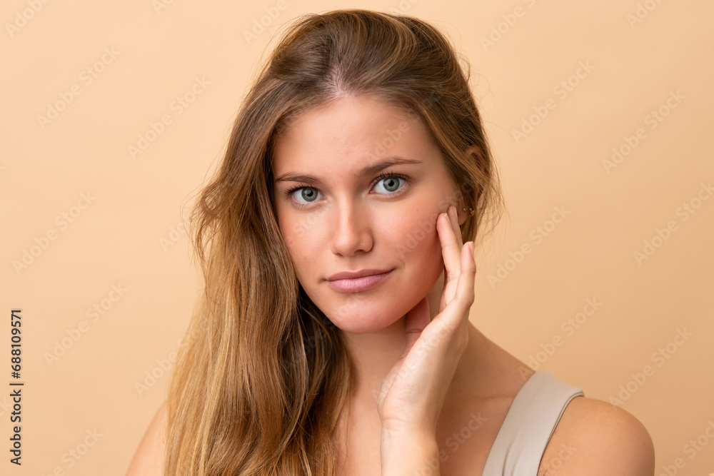 Portrait of blond pretty woman over isotaed background Portrait of blond pretty woman over isotaed background
