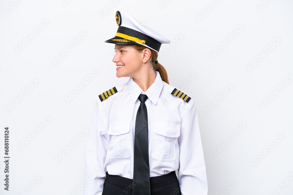 Airplane caucasian pilot woman isolated on white background looking side