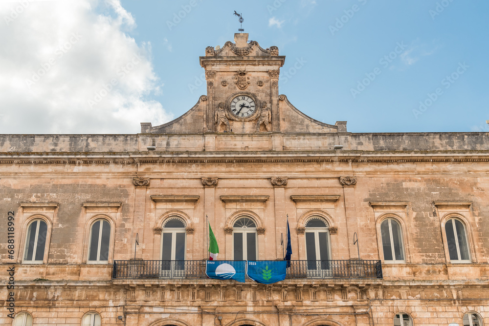 Facade of Town Hall palace on Liberty square in the historic center of Ostuni, province of Brindasi, Puglia, Italy