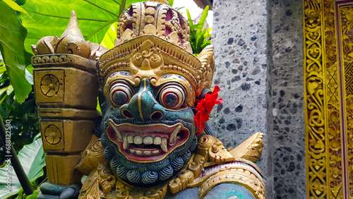 Traditional Balinese statues or called Arca made of stone carvings in the form of gods, people or demons, Balinese sculpture in temple