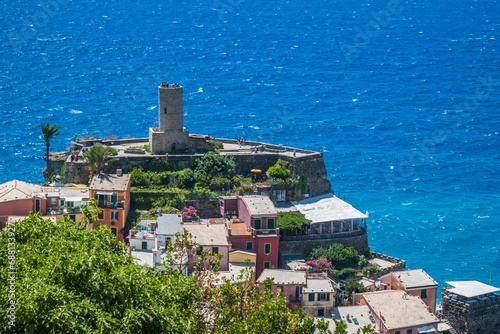 Architecture of Vernazza village with Doria castle on top and turquoise sea, ITALY