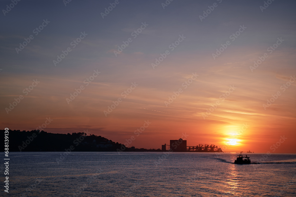 Beautiful sunset on the river Tagus, Lisbon.