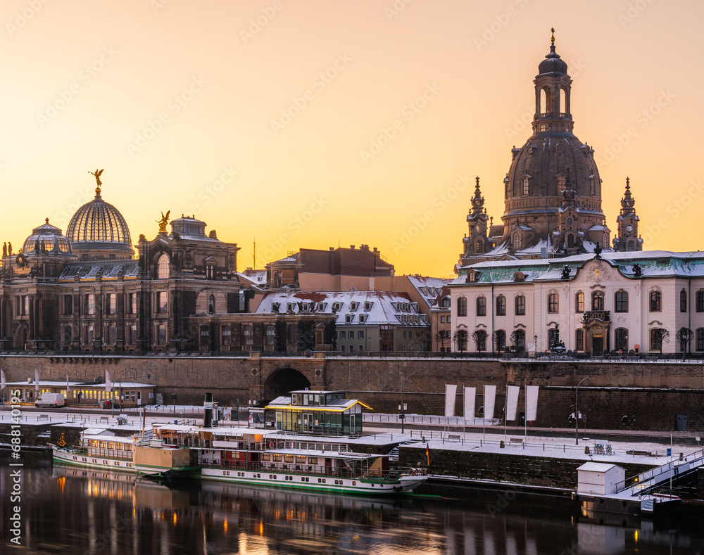 The historical waterfront with baroque buildings in Dresden early in the winter dawn. 
