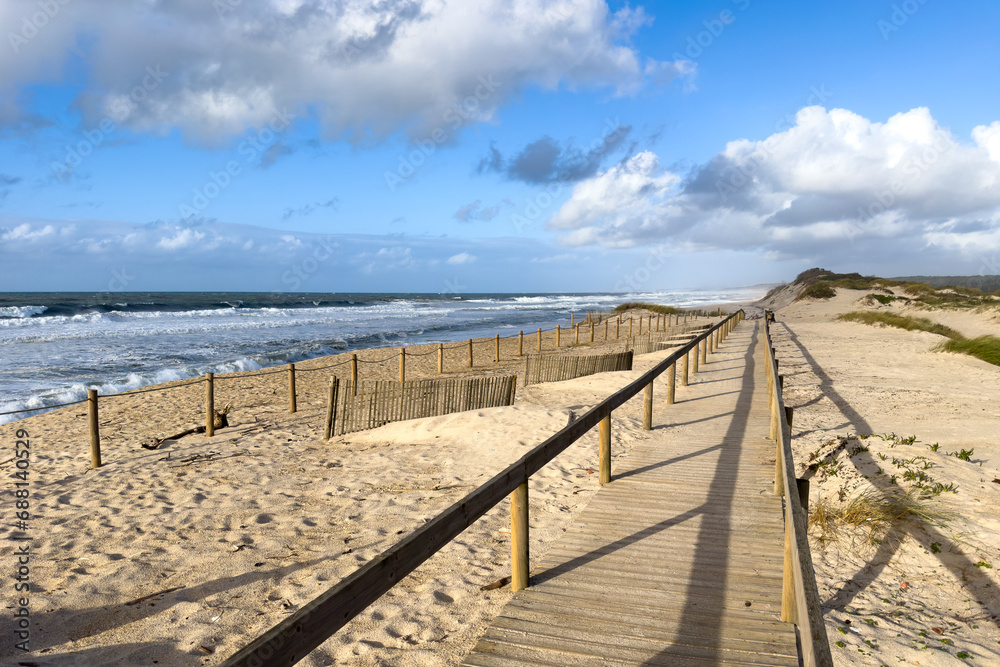 Wooden pathway leading to the beach Wooden pathway leading to the beach