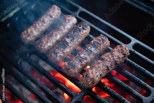 Cevapchichi is a type of kebab, a sausage made from ground meat with onions and spices, which is cooked on the grill.