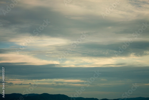Peaceful sky after a storm with pastel dramatic clouds and romantic atmosphere © ABContent Creator