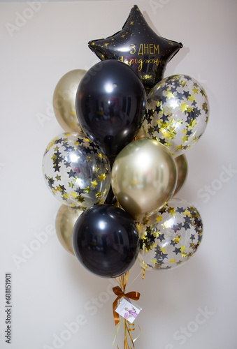 Set of golden black balloons, confetti balloons, birthday balloons, balloon lettering "Happy Birthday"
