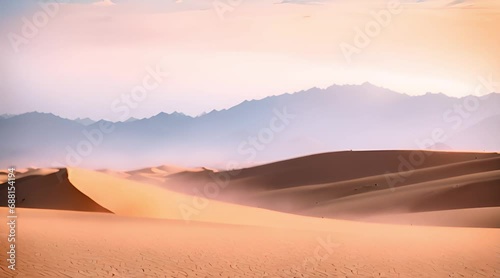 desert landscape with shifting sand dunes and an oasis in the distance photo