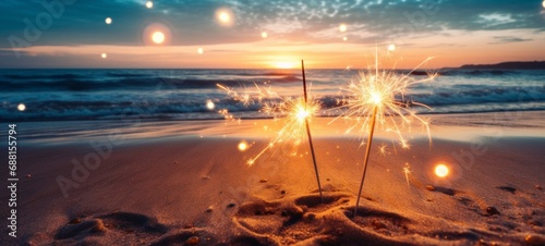Sylvester New Year, Vacation holiday New Year's Eve 2024 party event celebration holiday greeting card - Closeup of sparkling sparklers stuck in sand on beach with ocean in teh background photo
