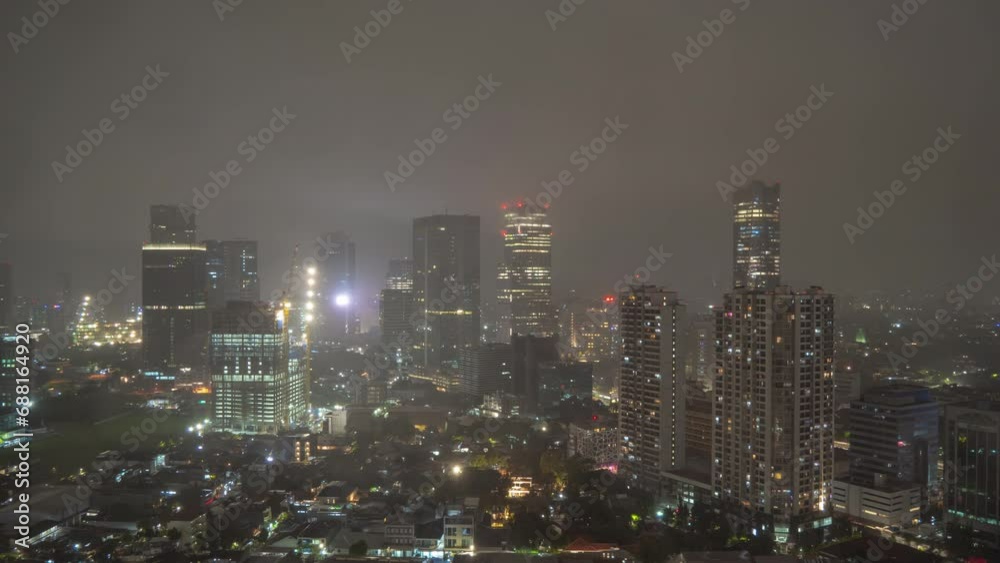 night rainy storm to morning jakarta city financial district downtown traffic rooftop panorama 4k timelapse indonesia night rainy storm to morning jakarta city financial district downtown traffic rooftop panorama 4k timelapse indonesia