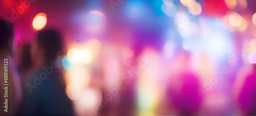 background of colorful lights Blurred bright background of people in noisy party