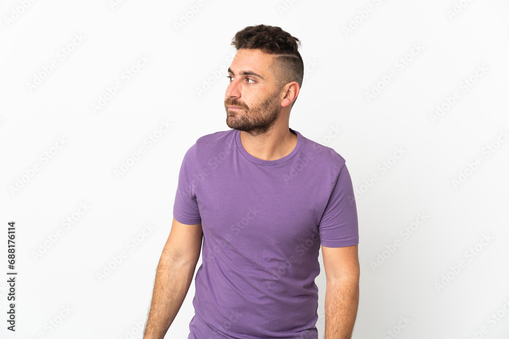 Caucasian man isolated on white background looking to the side Caucasian man isolated on white background looking to the side