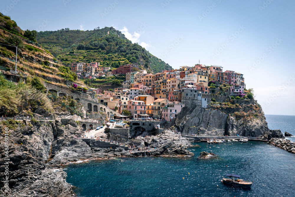 View of Manarola, one of the small fishing villages of Cinque Terre, italy. A little beautiful town on a coast