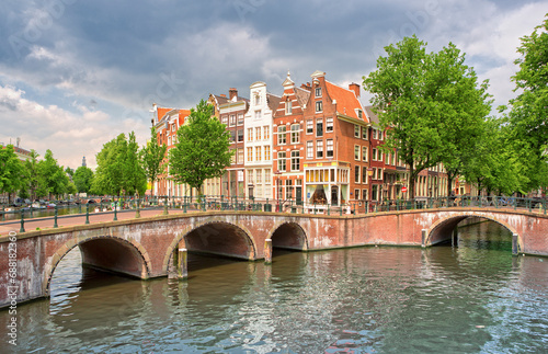 Bridge crossing of the Reguliersgracht with the Herengracht in Amsterdam photo
