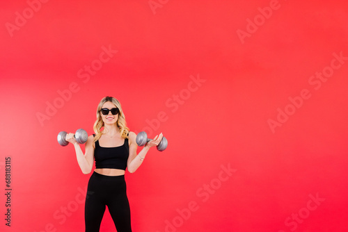 Woman, portrait and fitness, sunglasses and dumbbells, retro fashion accessory and muscle training.