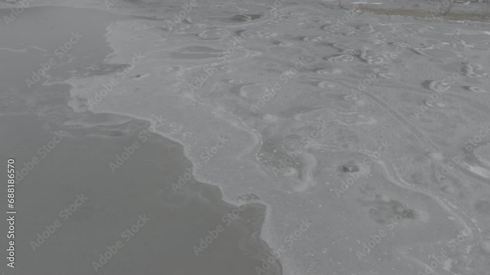 River Creek frozen with snow and ducks River Creek frozen with snow and ducks