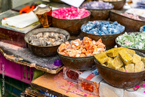 Bowls with different types of incense at a market in Jerusalem, Israel photo