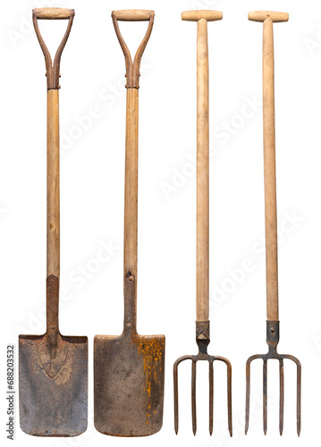 Old tools for tilling the land on the farm. Forks and spade on isolated background.