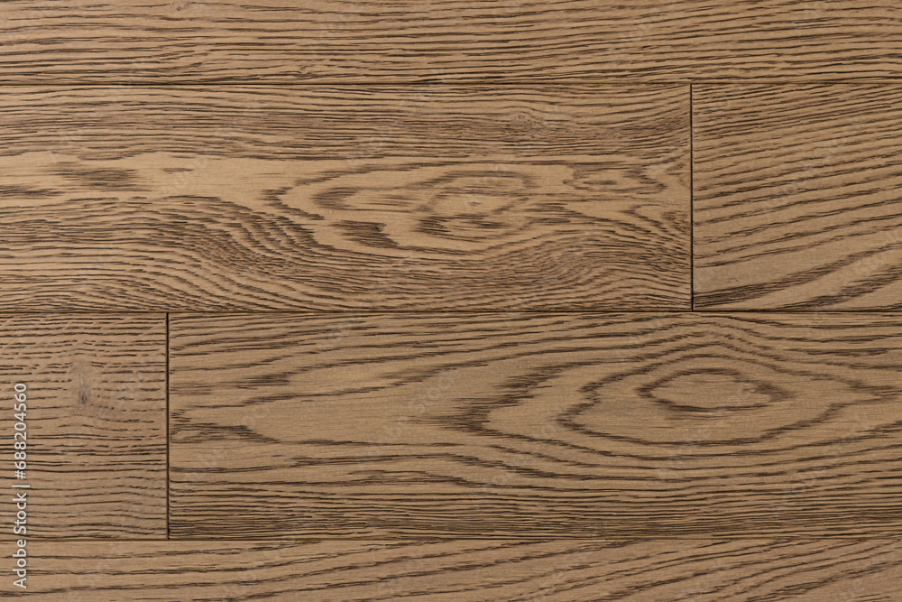 Fototapeta premium Texture of natural oak parquet close-up. Wooden boards for polished laminate. Hardwood sample background
