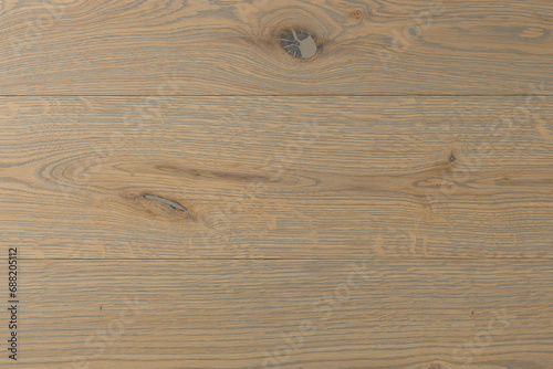 Texture of natural oak parquet close-up. Wooden boards for polished laminate. Hardwood sample background