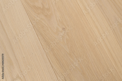 Texture of natural oak parquet. Wooden boards for polished laminate. Background of blank hardwood floor