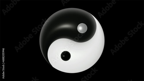 Oriental yin yang symbol animated on black background photo