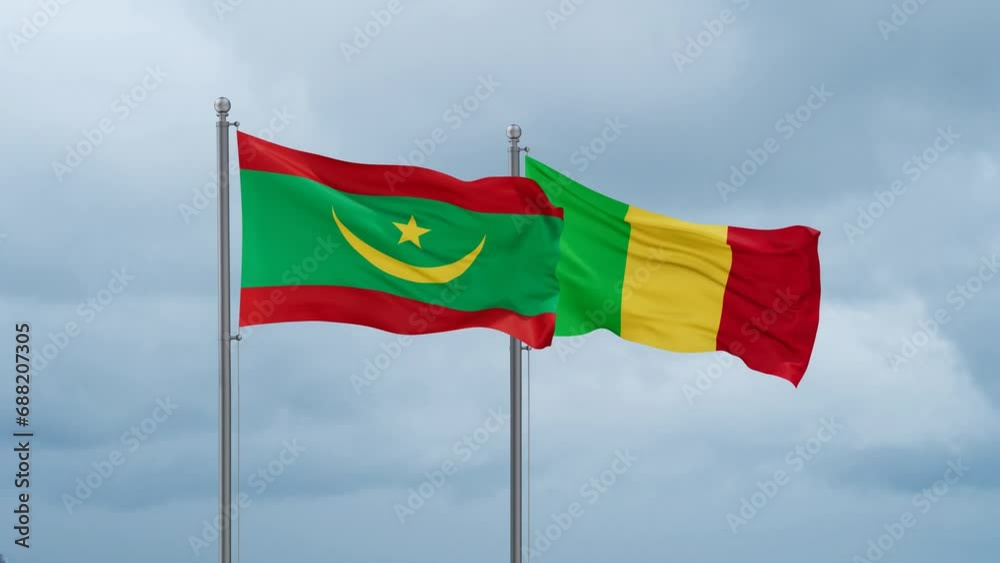 Mali and Mauritania flags waving together on cloudy sky, endless seamless loop, two country relations concept Mali and Mauritania flags waving together on cloudy sky, endless seamless loop, two country relations concept
