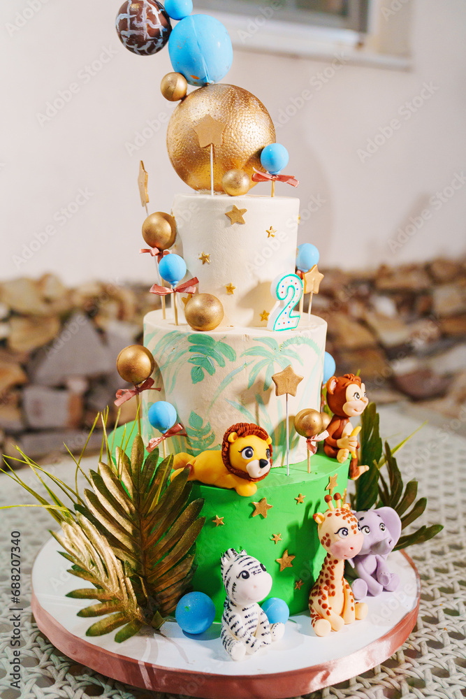 Children's birthday cake in jungle style. 
