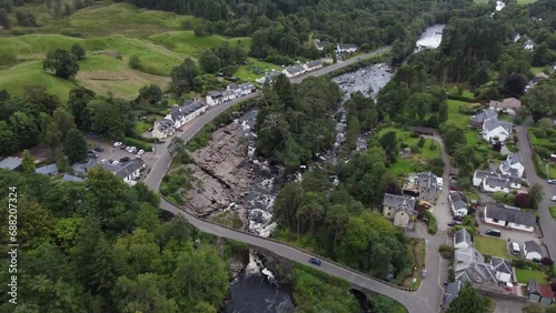 Aerial footage of the Falls of Dochart in Killin, Scotland. photo