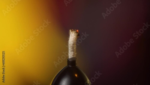 Macro shot of lighting a candle with a match