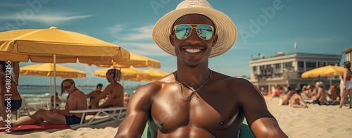 sunbathing happy african american man on the beach