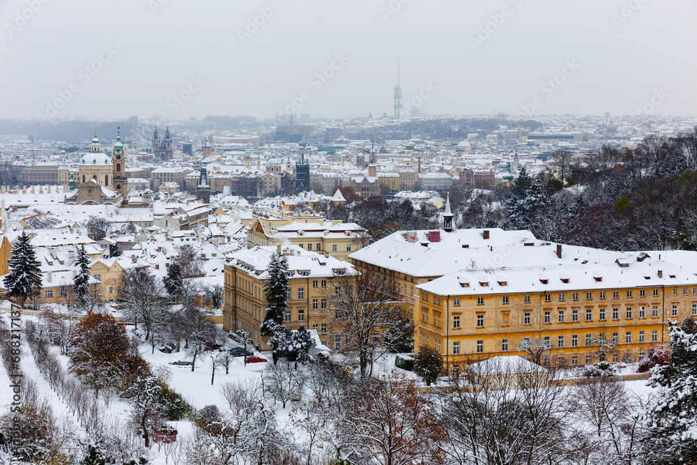 Romantic snowy Prague Lesser Town historical Roofs, Czech Republic
