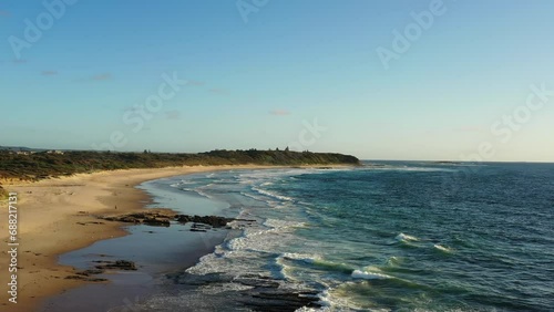 Wallpaper Mural Wide sandy Caves beach on Pacific coast of Australia in morning light as 4k.
 Torontodigital.ca