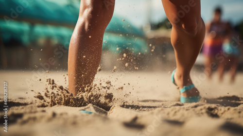 Player's feet in sand for leverage shifting grains vibrant beachwear controlled strength and determination in intimate beach volleyball moment photo