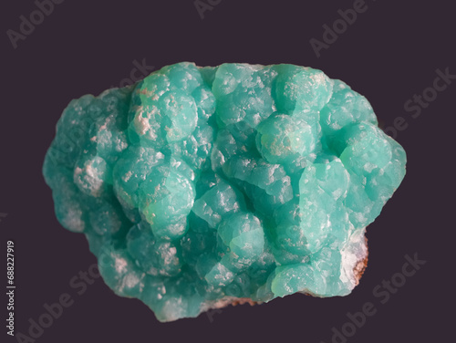 Close up on green Smithsonite mineral stone on microcline photo