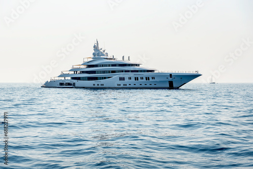 A large luxury private motor yacht under way sailing on the sea © Ivan