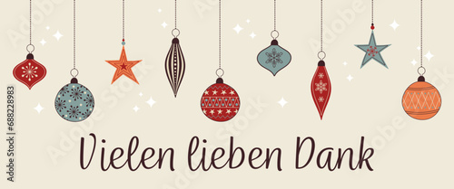 Vielen lieben Dank – Schriftzug in deutscher Sprache. Dankeskarte mit bunten Christbaumkugeln.