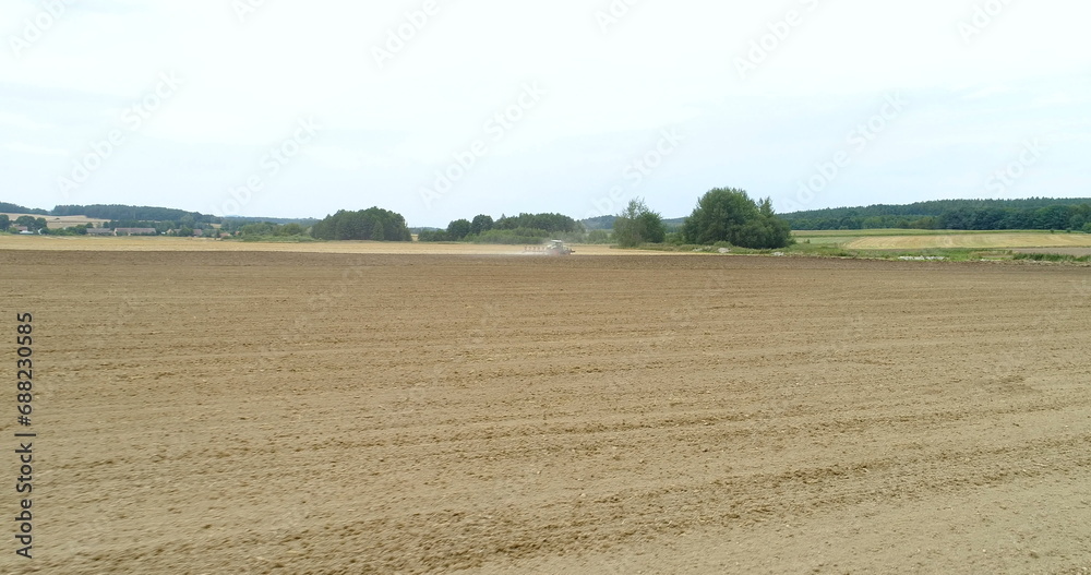 Cultivating field - Agriculture background.