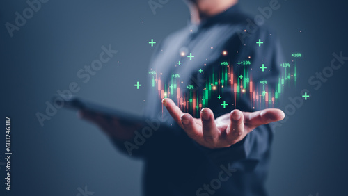 investor, business target planning and strategy, Stock market, Business growth, progress or success concept. Businessman or trader is showing a growing virtual hologram stock, invest in trading.