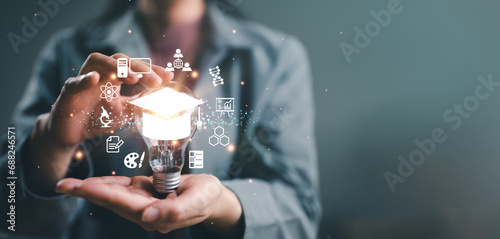 Elearning graduate certificate program concept. woman hands showing graduation hat in light bulb, Internet education course degree, study knowledge, creative thinking idea, problem solving solution photo