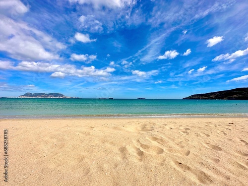 Playa de Getares beach near Algeciras on the Bay of Gibraltar with a view towards the Rock of Gibraltar, Andalusia, Spain