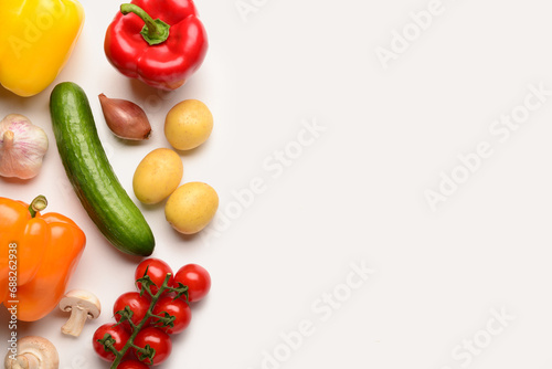 Fresh vegetables with mushrooms on white background