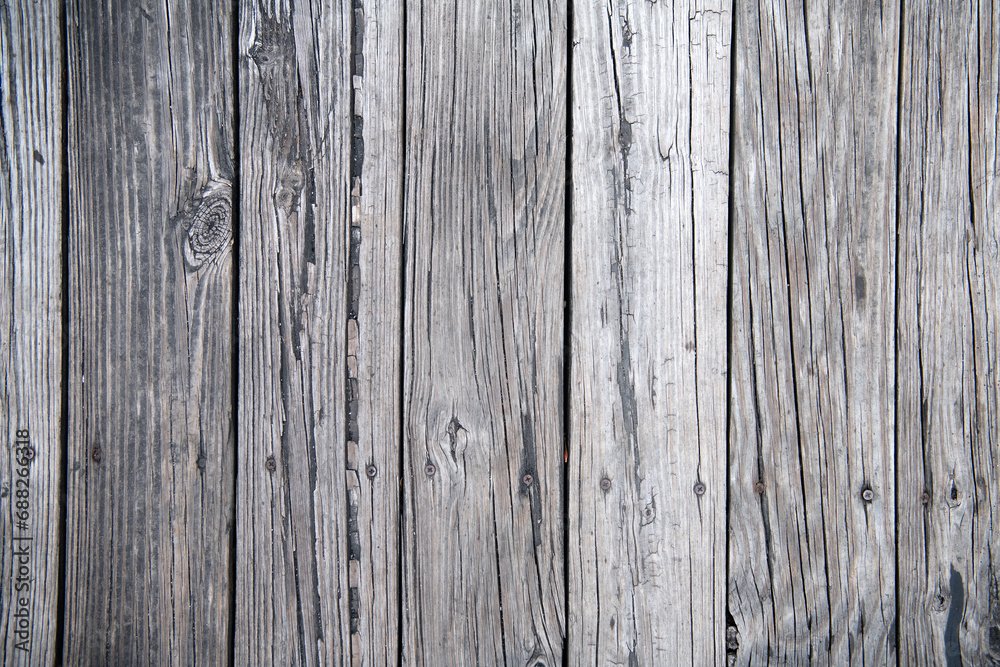 Naklejka premium Old Worn Out Weathered Wooden Planks Texture of cracks and scuffs. Space for text.