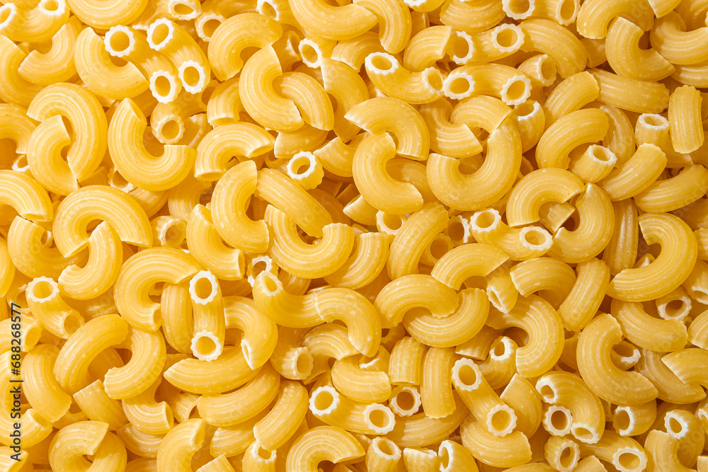 Uncooked Chifferi Rigati Pasta: A Culinary Canvas of Chifferi Rigati, Creating a Lively and Textured Background for Gourmet Cooking. Dry Pasta. Raw Macaroni - Top View, Flat Lay Uncooked Chifferi Rigati Pasta: A Culinary Canvas of Chifferi Rigati, Creating a Lively and Textured Background for Gourmet Cooking. Dry Pasta. Raw Macaroni - Top View, Flat Lay