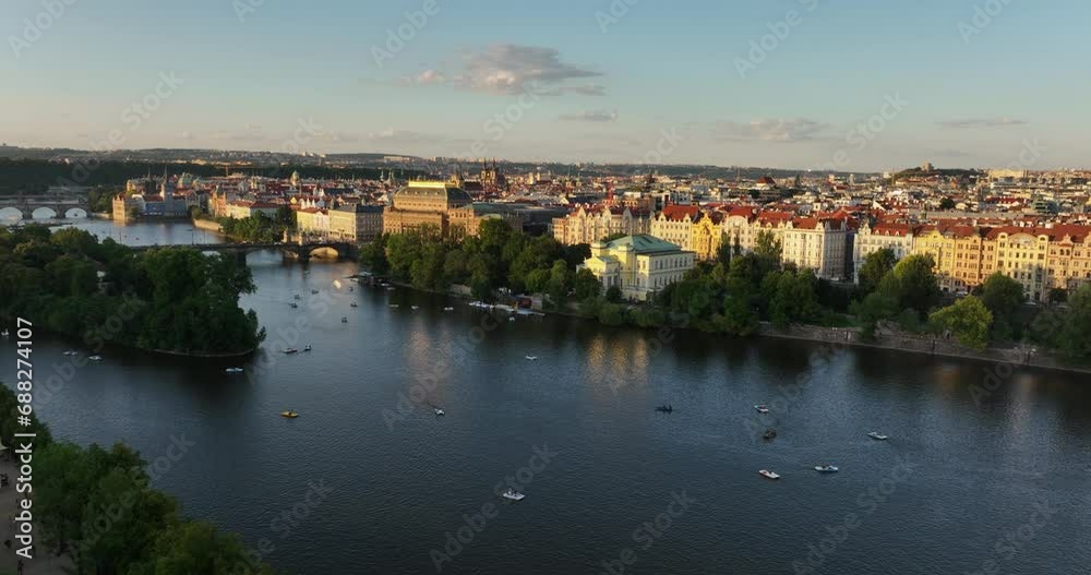 Panoramic aerial view of Prague Castle, aerial city. Cityscape of Prague, flight over city top view. Vltava River. Scenic aerial view of Prague architecture and Bridge in Prague Czech Republic. Panoramic aerial view of Prague Castle, aerial city. Cityscape of Prague, flight over city top view. Vltava River. Scenic aerial view of Prague architecture and Bridge in Prague Czech Republic.