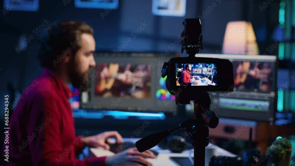 Professional camera equipment used by videographer in creative studio. Focus on video production gear in multimedia agency office used by post production editing expert in blurry background Professional camera equipment used by videographer in creative studio. Focus on video production gear in multimedia agency office used by post production editing expert in blurry background